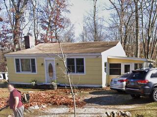 Here's a look at Lawrence and Brenda's roof from the front before the renovation. Click through to see the awesome transformation!