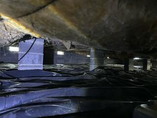 Dark and Wet Crawl Space
