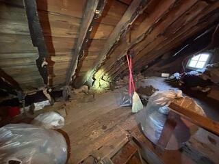 This dusty, empty attic was causing high humidity and uncomfortable temperatures for the homeowner.