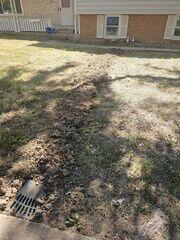 Here is the LawnScape™ that drains the water out of the basement and into the streets. Along with the IceGuards™ that are installed on the back wall.