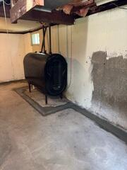 Radon Sealed Surface Drainage Around Basement Utilities