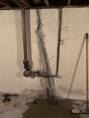 Before the Xypex System can be used on the crack, the area must be prepped and ready! We first chip out any faulty concrete and remove all loose materials from the area. Then the crack is saturated with clean water.