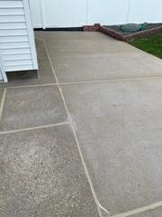 NexusPro joint sealant was applied between slabs to stop water from seeping into voids below. This step helps prevent washout and extends the life of the patio.
