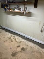 WaterGuard is installed against the walls and floors and directs water seepage to the sump pump.