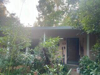 Front of home after Gutter Shutter installation
