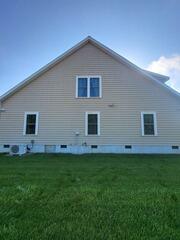 The siding was covered with mold and mildew stains.