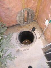 This is an inactive sump, but it still need an airtight cover over it. The radon system's penetration point will be in this area.