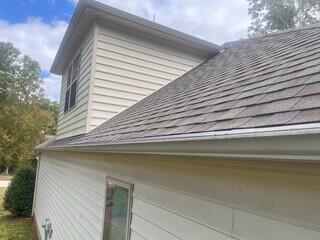 Side of home after Rain Drop installation