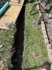 Excavating Drainage Pipe Trench