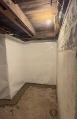 Vapor Barrier and Drainage System Installed
