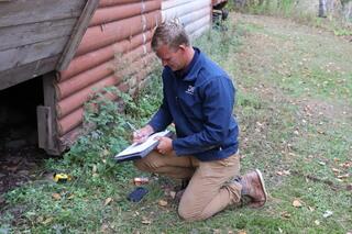 Before repairs began, Design Specialist Jake Gilmer conducted a full crawl space inspection and measurements. His evaluation helped the camp board move forward confidently with a plan to stabilize and encapsulate the cabin foundation.