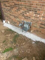 Underneath the gravel is where we installed the SillPlate™ drain tile.