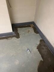 The WaterGuard™ system collects water that seeps through basement walls and drains it to your sump pump.