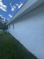 Many cracks had appeared across the home's exterior walls in varying shapes and sizes, clearly indicating structural issues with the foundation.