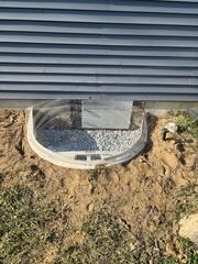 Everlast Window Well was installed to keep debris out of the crawl space while still letting light in.