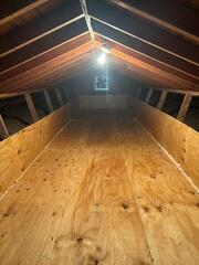 Finished Attic with Insulation and Storage Space