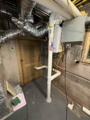 Dual Radon Mitigation System Installation in a 1920s Branford Home