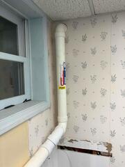 Branford Split-Level Home: Dual Pipe Radon Mitigation