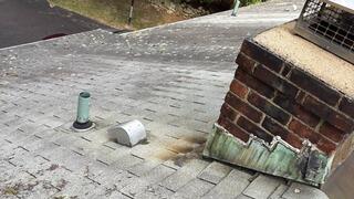 Before: Deteriorating Shingles & Flashing
