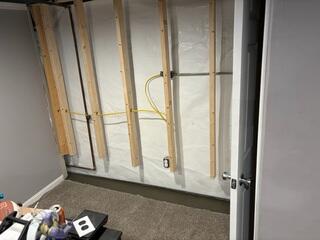 We were able to fit our CleanSpace vapor barrier behind the drywall studs. This vapor barrier will help protect the drywall the homeowners plan to reinstall.