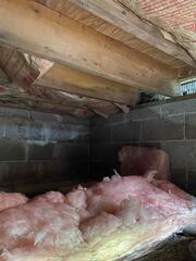 This open vented crawl space brought in wet air. This wet air ruined the fiberglass and made it very heavy, causing it to fall from the ceiling.