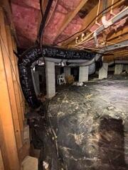 Crawl Space with Wooden Beams