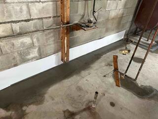 WaterGuard Gets Installed with a Strip of BrightWall Panel Behind It