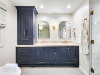 Elegant Blue Cabinets with Brushed Gold Hardware and Fixtures