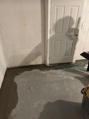 TrenchDrain Surface Drainage in Front of Basement Doorway