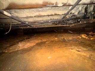 Messy and Wet Crawl Space
