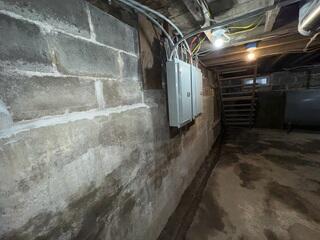 Waterproofing Leaky Basement in Augusta, Maine Rental Property