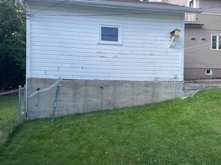 Before: Shifting Garage Wall and Foundation Cracks