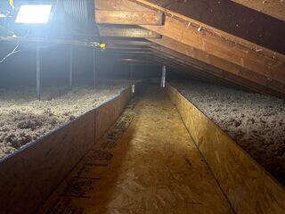blown-in insulation and catwalk installation