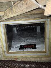 The finished crawl space is sealed with CleanSpace® and SilverGlo®, creating a dry, bright, and energy-efficient environment.