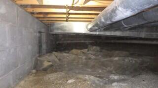 Dirty and Debris-Filled Crawl Space