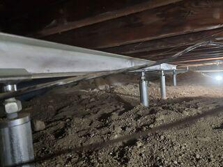 These SmartJacks©  were installed into engineered fill before the dirt was replaced to cover them and make the crawl space level.