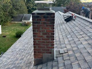 New Flashing Is Installed on the Chimney