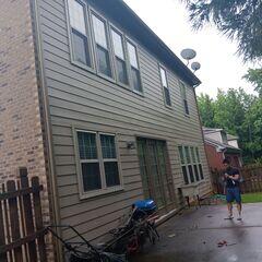 Checking out his new gutter system