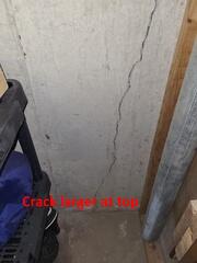 Crack larger at top.