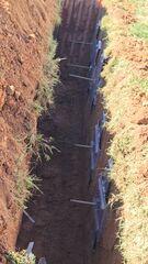 Excavation Reveals Severe External Pressure Against Foundation Walls