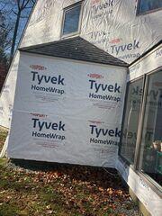 Once we install the layers of protection under the siding, we will install and secure the flashing.