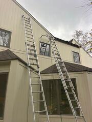 Inspecting the completed siding install