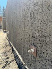 Soil Nail Bearing Plate Installed on Fresh Shotcrete