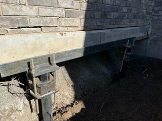 Brackets Secured to Footing