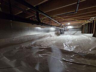 Our CleanSpace liner is made of heavy, 20 mil thick plastic with "UltraFresh" antimicrobial properties molded right into the material. It is permanently installed onto our SilverGlo insulation to strengthen the crawl space's waterproofing and insulation systems.