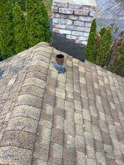 Inspecting the roof and chimney