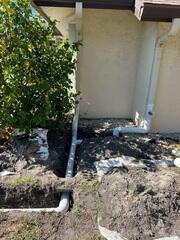 Subsurface Downspout Connection