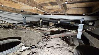 SmartJack® Columns Secured Along Main Beam for Structural Correction