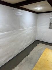 The WaterGuard™ system collects water that seeps through basement walls and drains it to your sump pump.