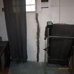 This is the most common area to see a wall crack. At the bottom of the window.